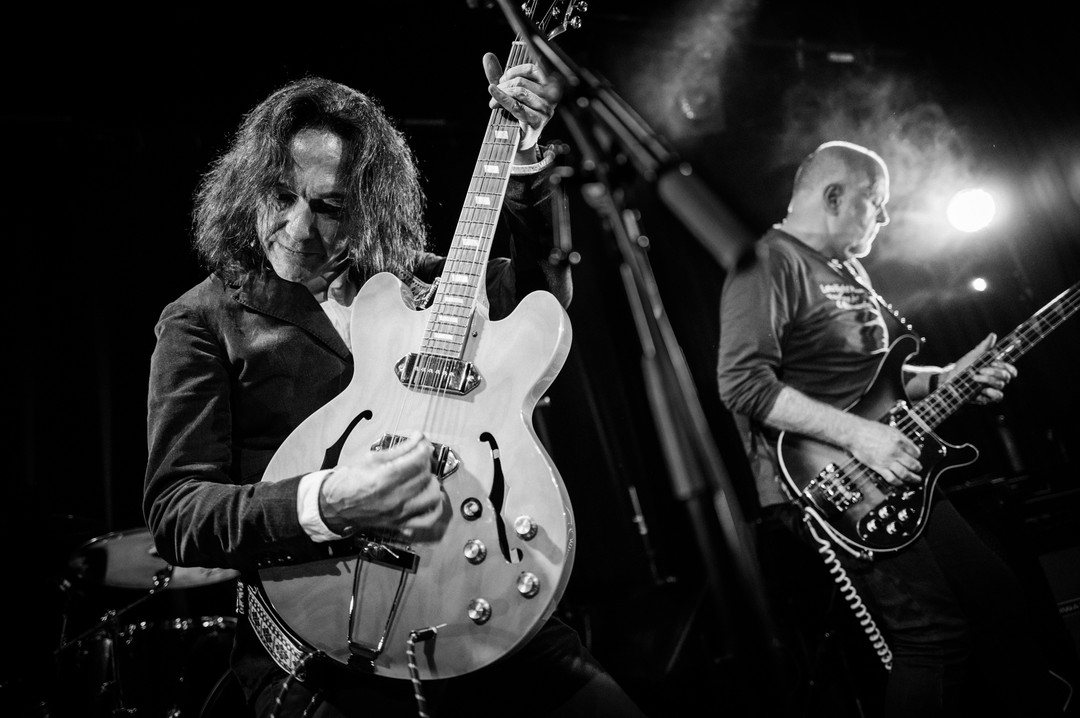 Guitarist on stage, black and white
