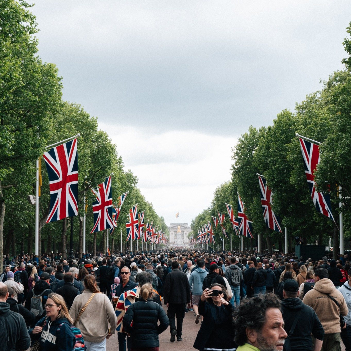 Crowds and Union Jack flags on The Mall